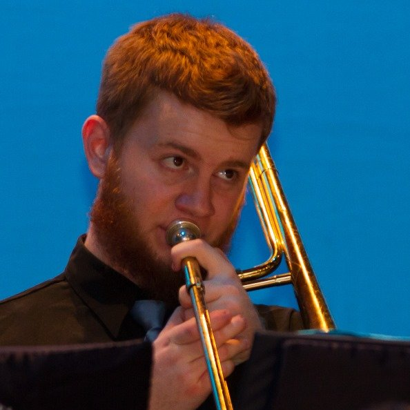 Me in high school, playing a trombone.