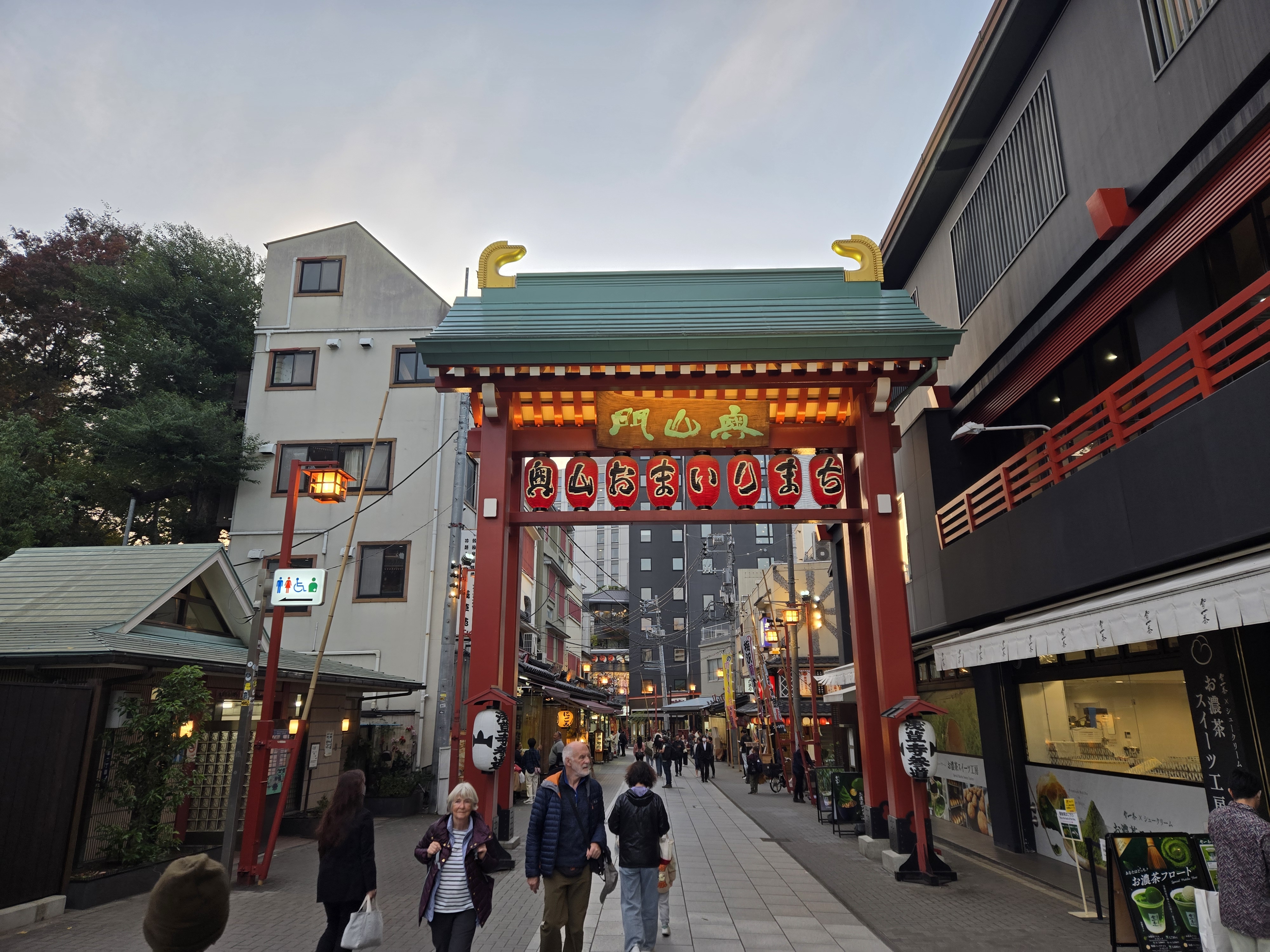 A photo of one of the minor entrances/exits of the temple grounds, that backs on to a pedestrian-friendly street.