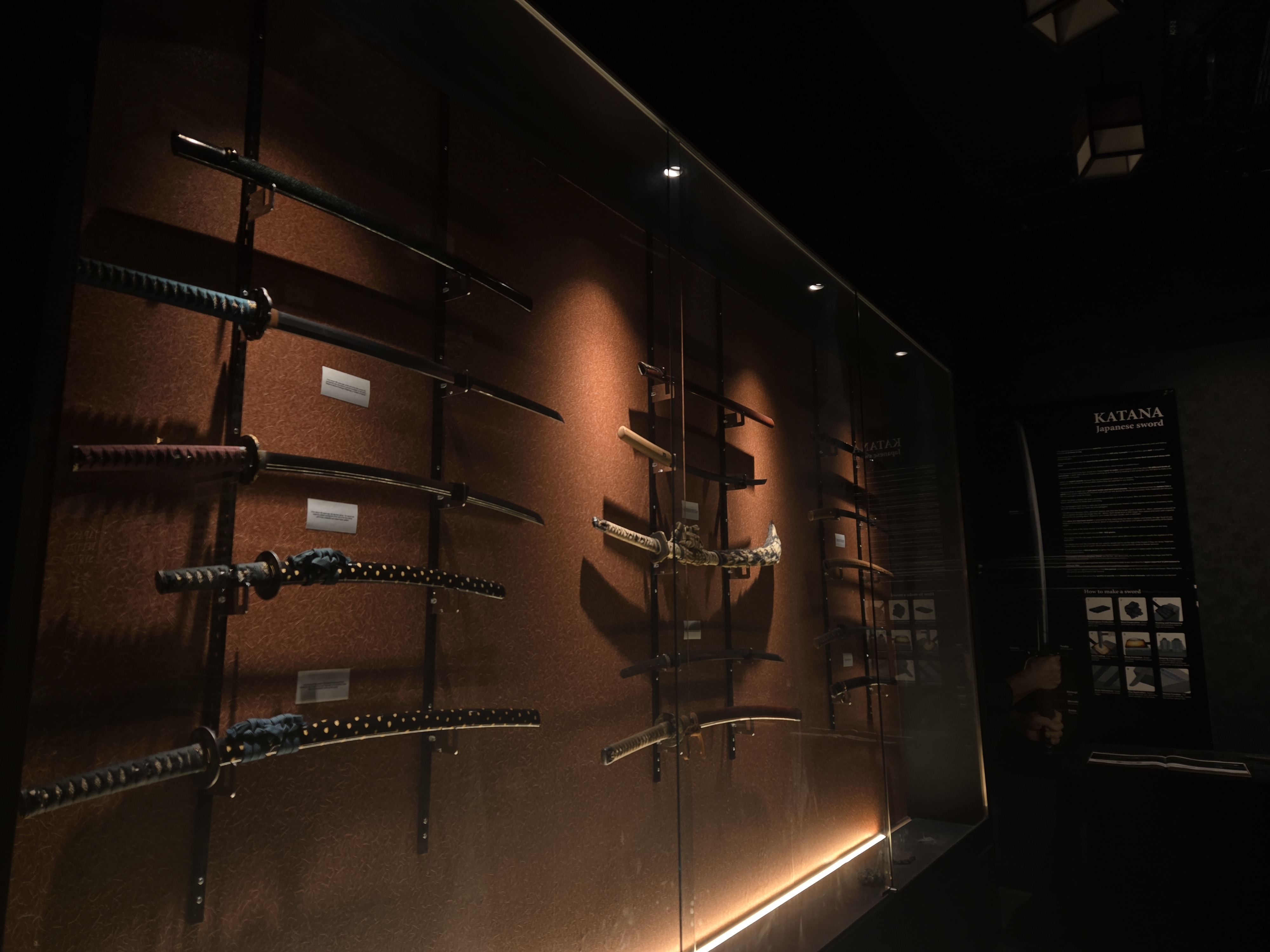 A protected display showing even more sword types - these ones are larger, and older. I'm 90% sure they're authentic - the tour guide even pointed out that samurai kept their weaponry in pristine condition, making it easier to preserve in the museum.