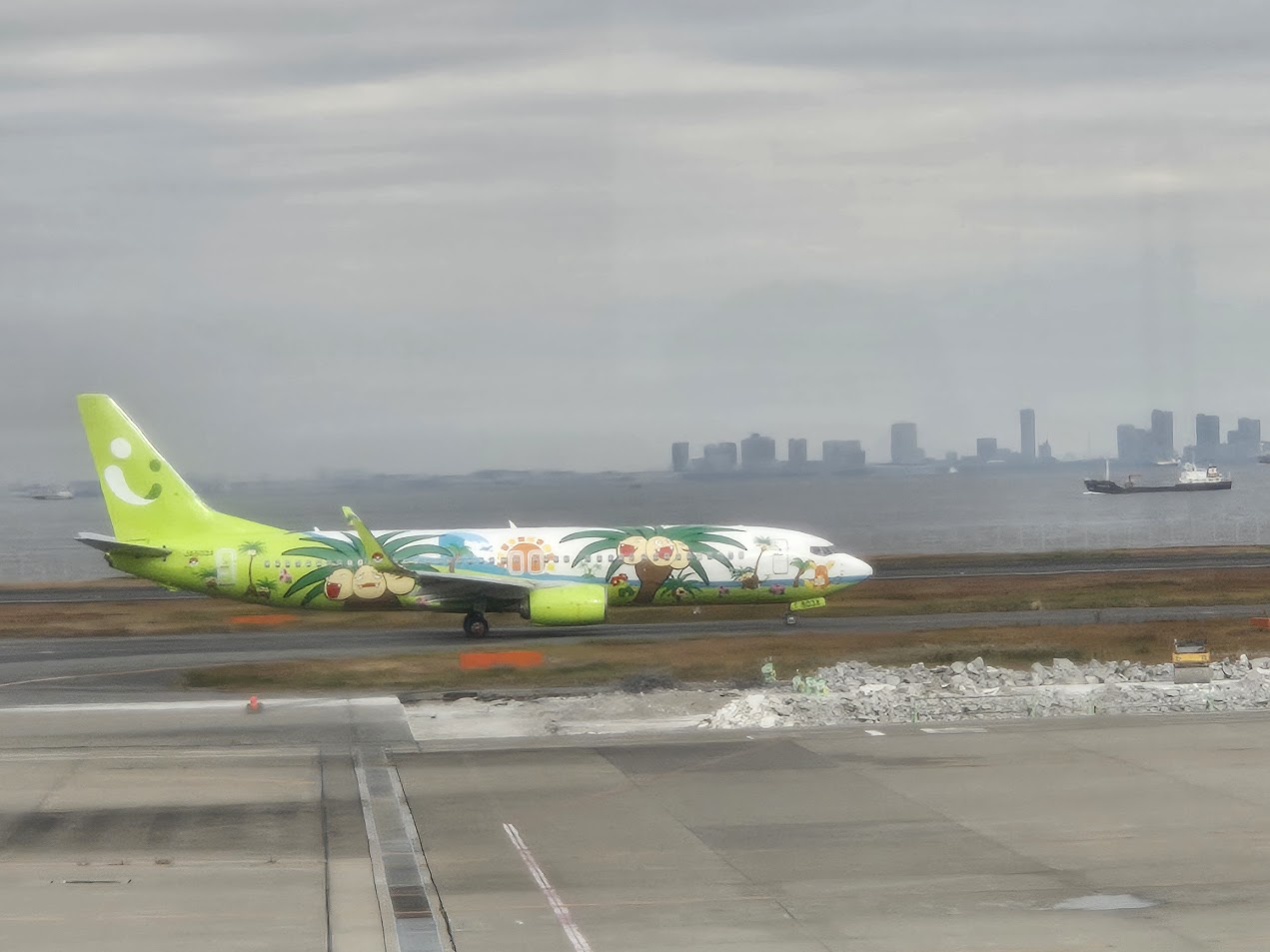A photo of an airplane with a Pokemon-themed livery.