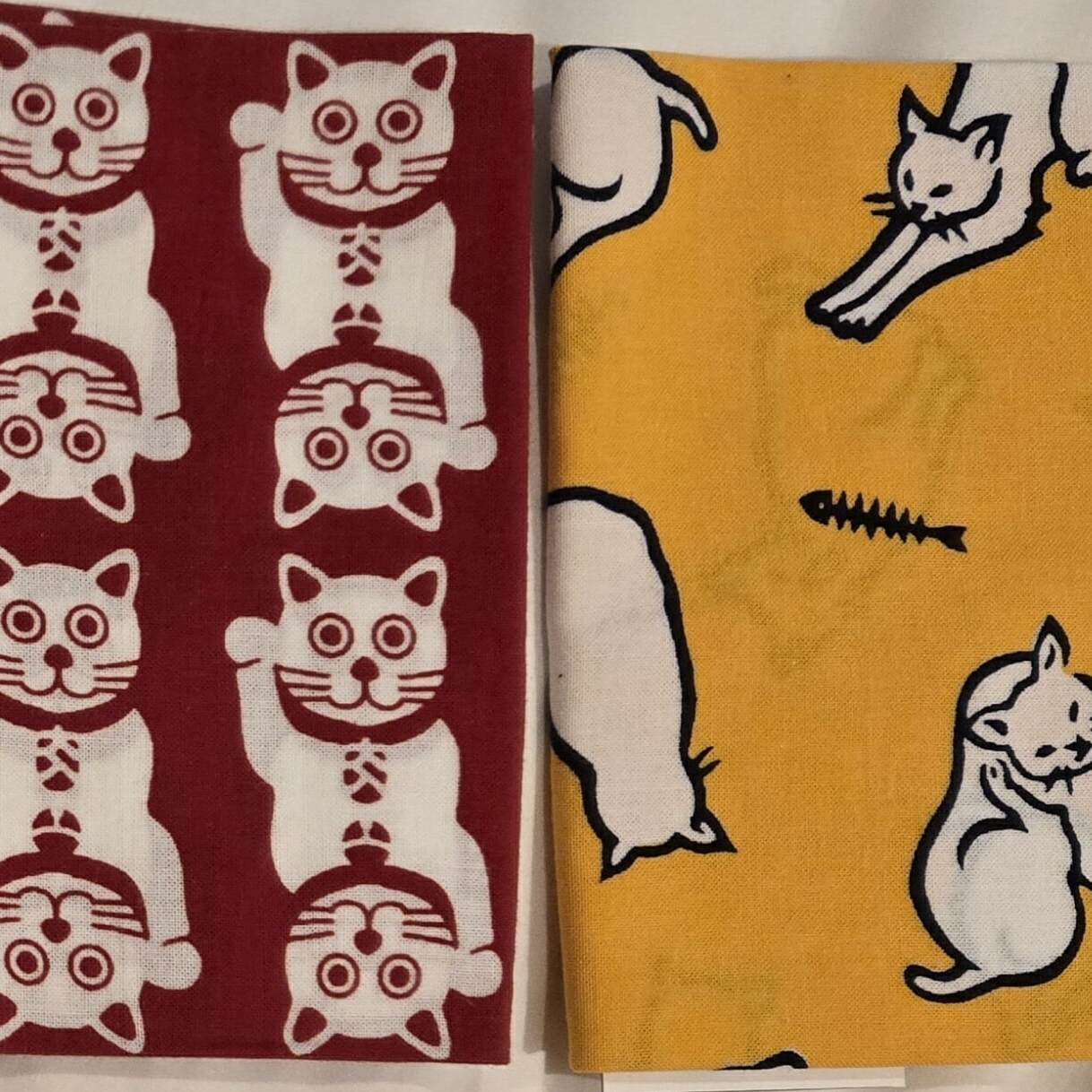 A photo of a Japanese tenugui, a type of screenprinted fabric.