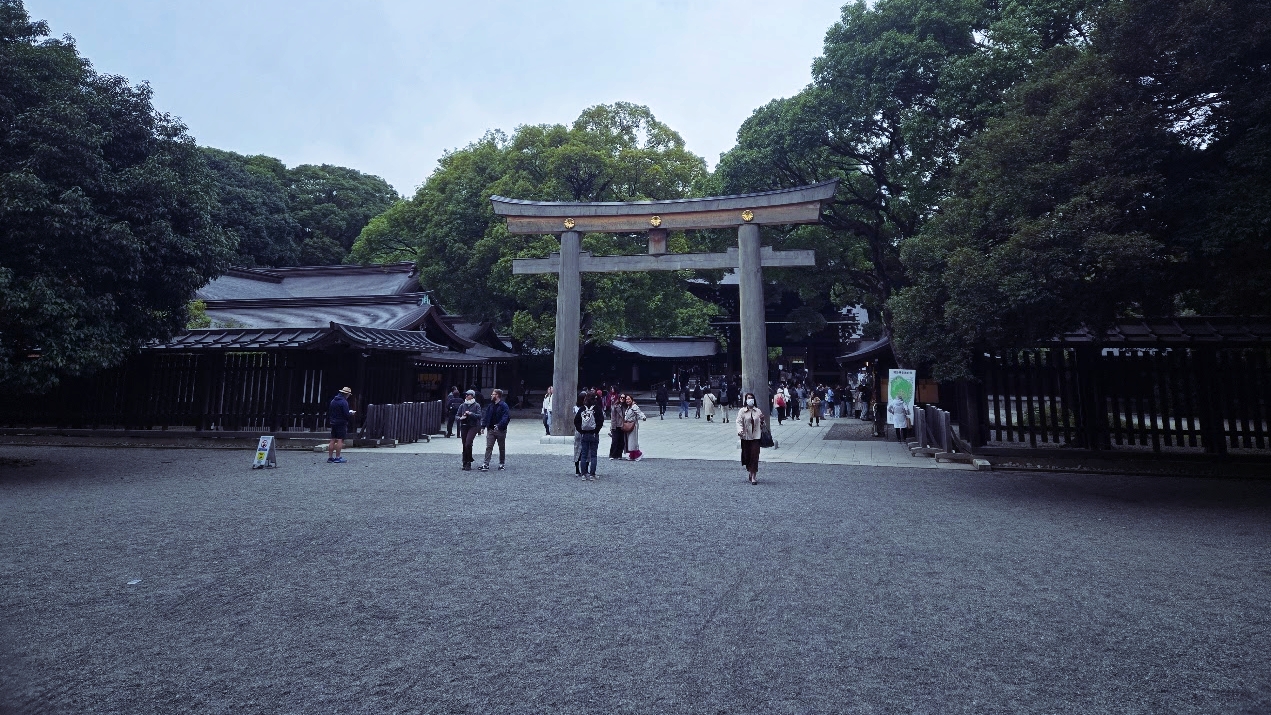A photo of a road full of people.