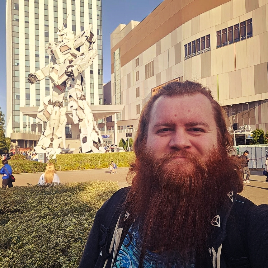 A selfie of me in front of the Unicorn Gundam.